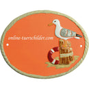 Türschild aus Keramik Möwe auf einem Poller personalisiert Türschild  Terracotta 